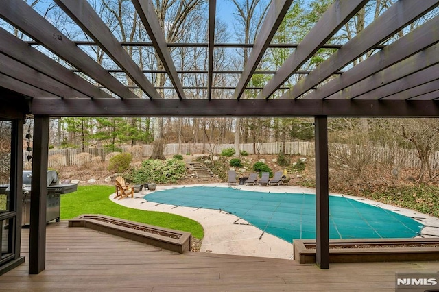 717 Ashmont Rd, Franklin Lakes, NJ 07417 - view of swimming pool featuring a wooden deck, a fenced backyard, a pergola, and a grill