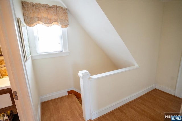 87 Pilch St, Bloomfield, NJ 07003 - staircase featuring wood finished floors and lofted ceiling