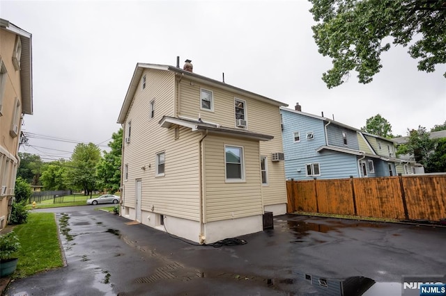 87 Pilch St, Bloomfield, NJ 07003 - back of property with a chimney