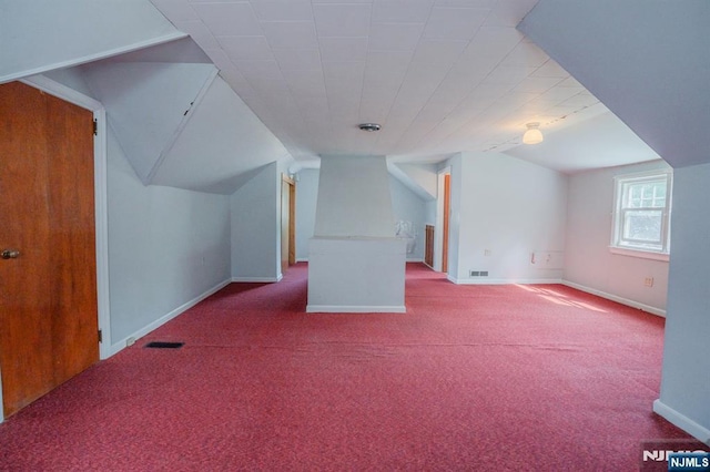 11 Newman Ave, Nutley, NJ 07110 - additional living space with carpet floors, baseboards, and vaulted ceiling