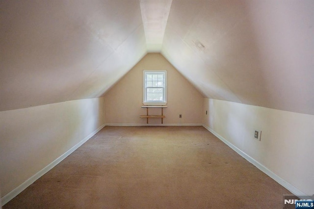 11 Newman Ave, Nutley, NJ 07110 - bonus room with vaulted ceiling, carpet floors, and baseboards