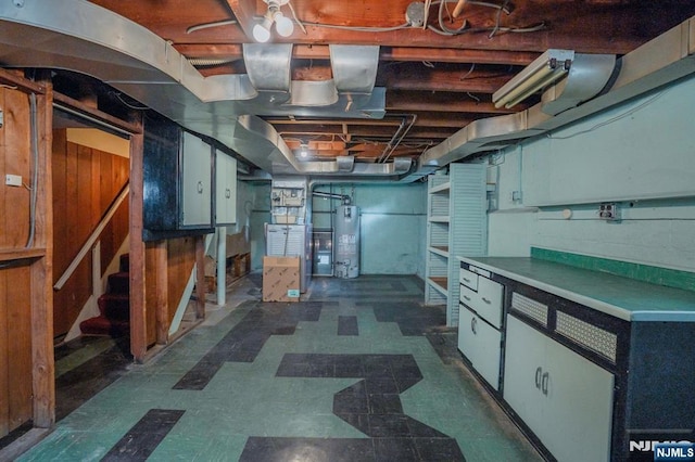 11 Newman Ave, Nutley, NJ 07110 - unfinished below grade area with water heater, dark floors, and stairway