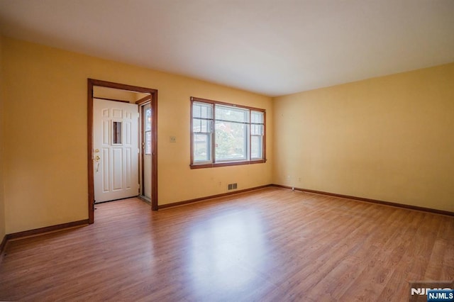 11 Newman Ave, Nutley, NJ 07110 - empty room with wood finished floors and baseboards