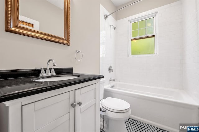 67 Woodland Rd, Bloomfield, NJ 07003 - full bathroom with toilet, vanity, and washtub / shower combination