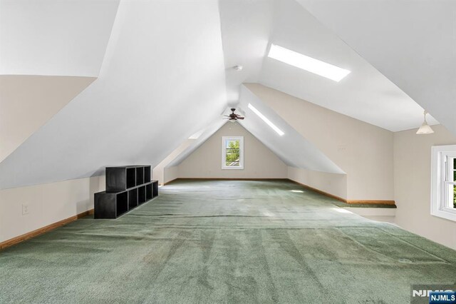 67 Woodland Rd, Bloomfield, NJ 07003 - bonus room featuring carpet floors, lofted ceiling, baseboards, and ceiling fan
