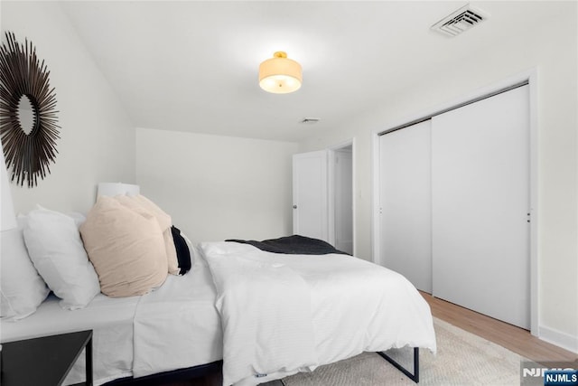 530 Broad Ave Unit 2, Englewood, NJ 07631 - bedroom with wood finished floors and a closet