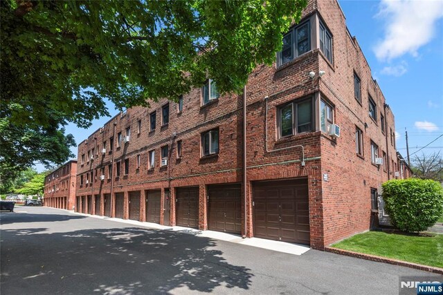 530 Broad Ave Unit 2, Englewood, NJ 07631 - view of property featuring cooling unit