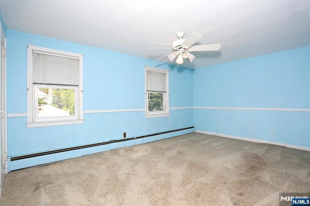 408 Terhune Ave, Paramus, NJ 07652 - carpeted spare room featuring a baseboard heating unit, a ceiling fan, and baseboards