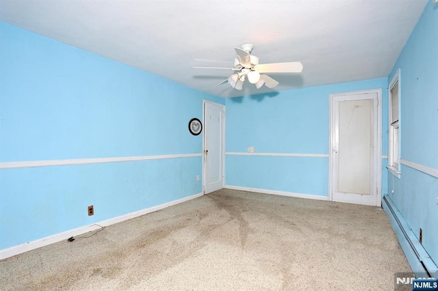 408 Terhune Ave, Paramus, NJ 07652 - carpeted spare room with a baseboard heating unit, ceiling fan, and baseboards