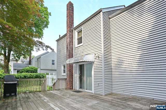 408 Terhune Ave, Paramus, NJ 07652 - wooden deck with a grill