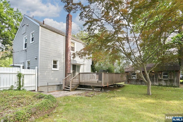 408 Terhune Ave, Paramus, NJ 07652 - rear view of property featuring a deck and a chimney