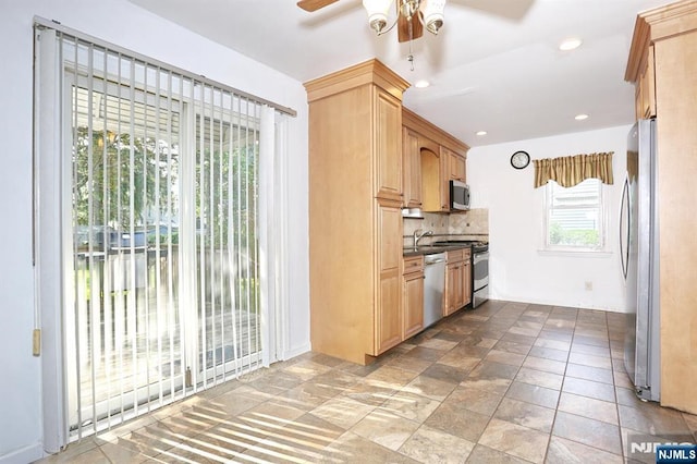 408 Terhune Ave, Paramus, NJ 07652 - kitchen with appliances with stainless steel finishes, a ceiling fan, decorative backsplash, dark countertops, and light brown cabinets