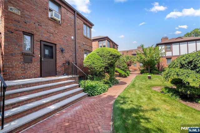 530 Broad Ave Unit 17, Englewood, NJ 07631 - view of home's community with a yard