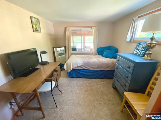 40 Shore Dr, Newton, NJ 07860 - carpeted bedroom with multiple windows and an office area