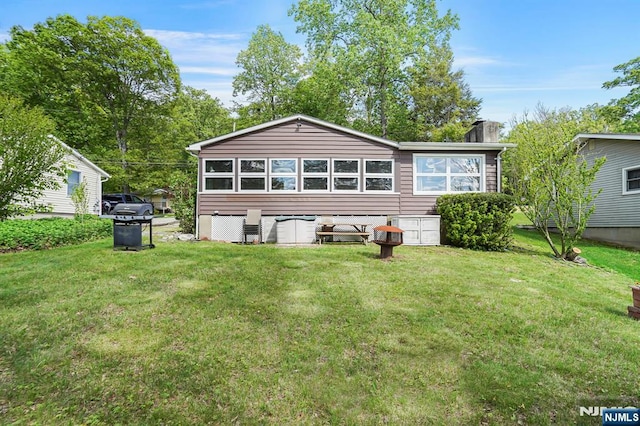 40 Shore Dr, Newton, NJ 07860 - rear view of property featuring a lawn and a chimney