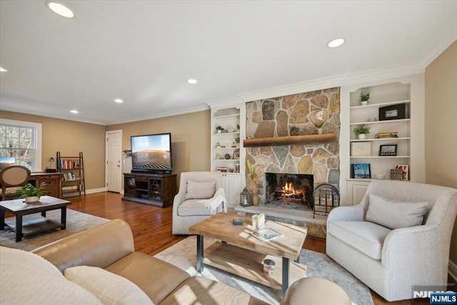 14 Old Chimney Rd, Randolph Township, NJ 07869 - living area featuring wood finished floors, a fireplace, ornamental molding, recessed lighting, and built in shelves