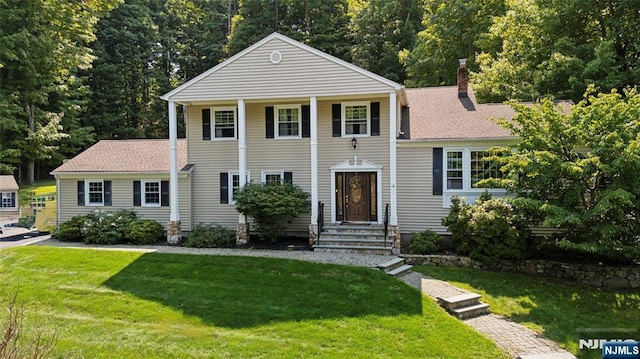 14 Old Chimney Rd, Randolph Township, NJ 07869 - greek revival house featuring a chimney, a front yard, and roof with shingles