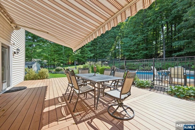 14 Old Chimney Rd, Randolph Township, NJ 07869 - wooden deck with outdoor dining area and view of scattered trees