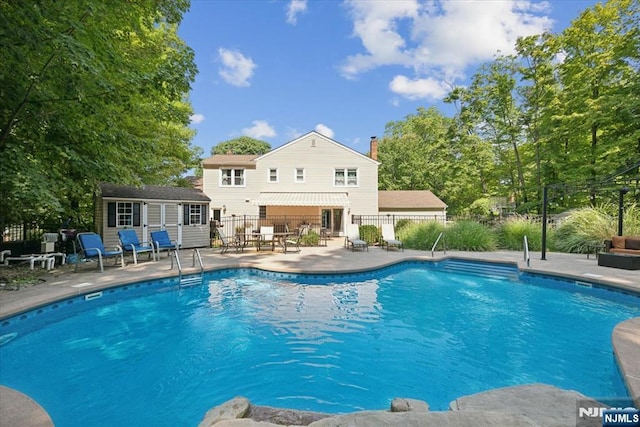 14 Old Chimney Rd, Randolph Township, NJ 07869 - view of swimming pool featuring an outbuilding and a patio area