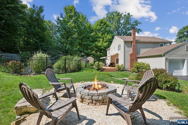 14 Old Chimney Rd, Randolph Township, NJ 07869 - view of patio featuring an outdoor fire pit, a garage, and a deck