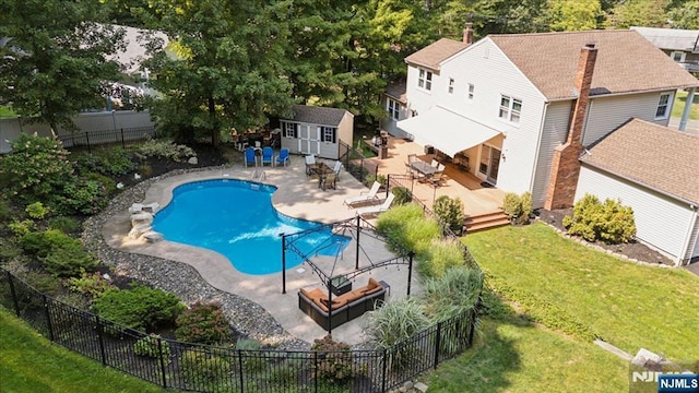 14 Old Chimney Rd, Randolph Township, NJ 07869 - view of pool with an outbuilding, a wooden deck, and outdoor dining space