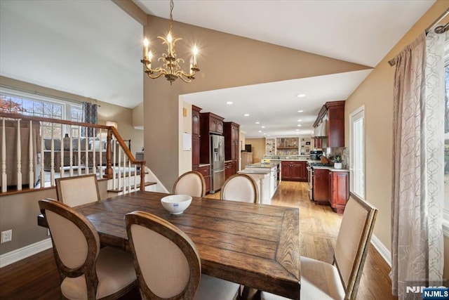 14 Old Chimney Rd, Randolph Township, NJ 07869 - dining space featuring a chandelier, light wood-style flooring, baseboards, stairs, and recessed lighting