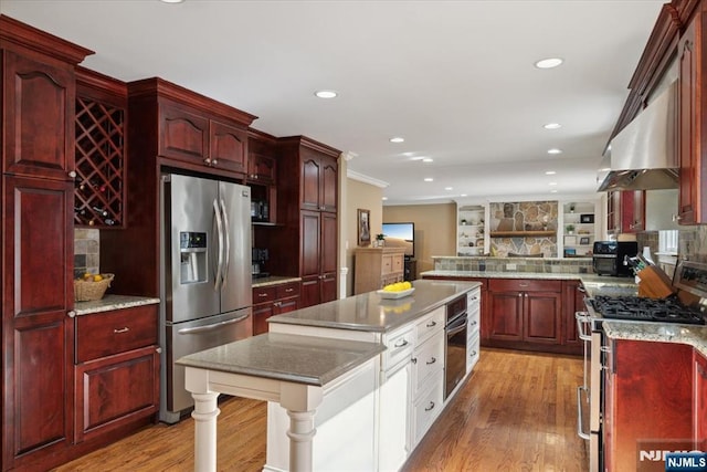 14 Old Chimney Rd, Randolph Township, NJ 07869 - kitchen with stainless steel appliances, reddish brown cabinets, light wood-style flooring, recessed lighting, and ornamental molding