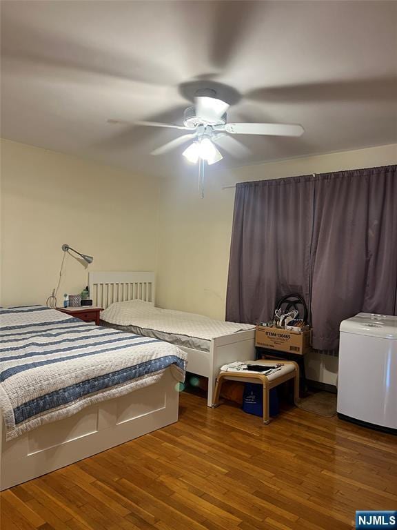 715 Broad Ave Unit 5A, Ridgefield, NJ 07657 - bedroom with wood finished floors and ceiling fan