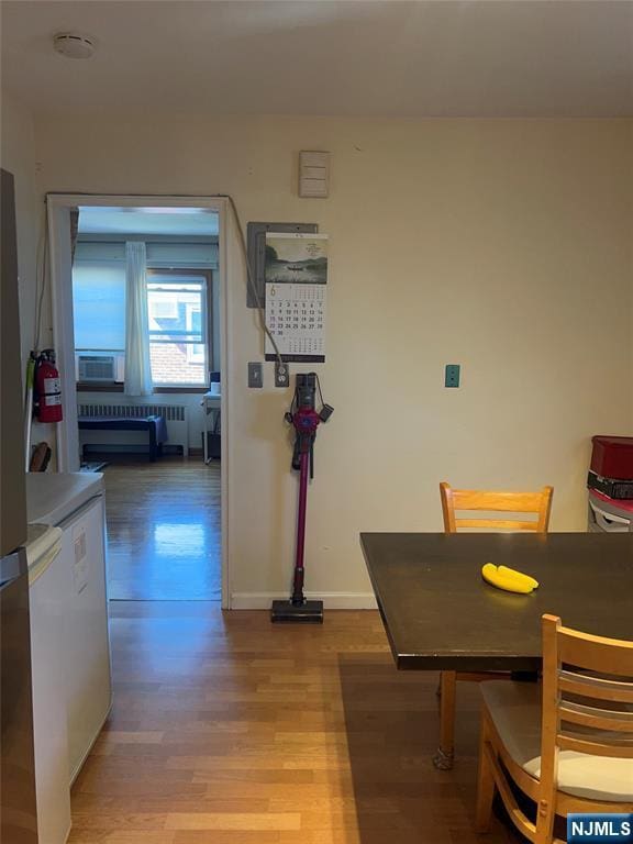 715 Broad Ave Unit 5A, Ridgefield, NJ 07657 - dining room with light wood-style floors