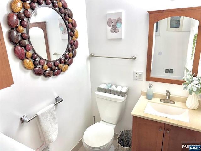 22 Church St, Nutley, NJ 07110 - half bath featuring toilet and vanity