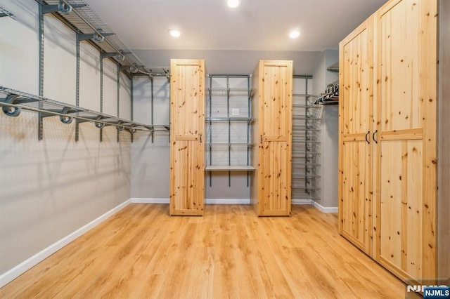 22 Foxboro Ln Unit H, West Milford, NJ 07480 - walk in closet featuring wood finished floors