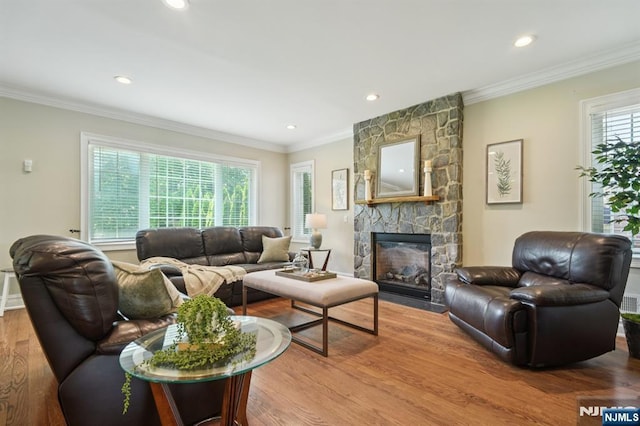 19 Grandview Ave, Glen Rock, NJ 07452 - living room featuring wood finished floors, crown molding, a fireplace, and recessed lighting