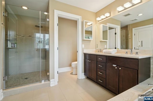 19 Grandview Ave, Glen Rock, NJ 07452 - bathroom featuring double vanity, a stall shower, toilet, baseboards, and tile patterned floors