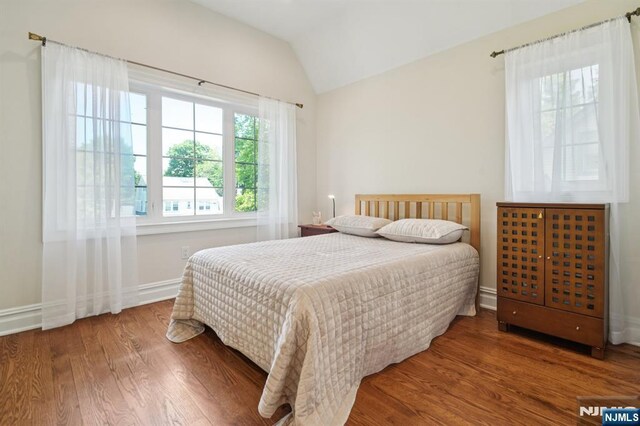 19 Grandview Ave, Glen Rock, NJ 07452 - bedroom featuring lofted ceiling, wood finished floors, and baseboards