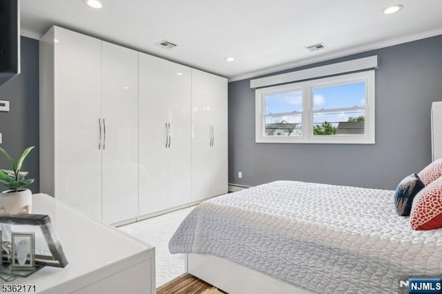 3-11 Lyncrest Ave, Fair Lawn, NJ 07410 - bedroom with recessed lighting, crown molding, and a closet