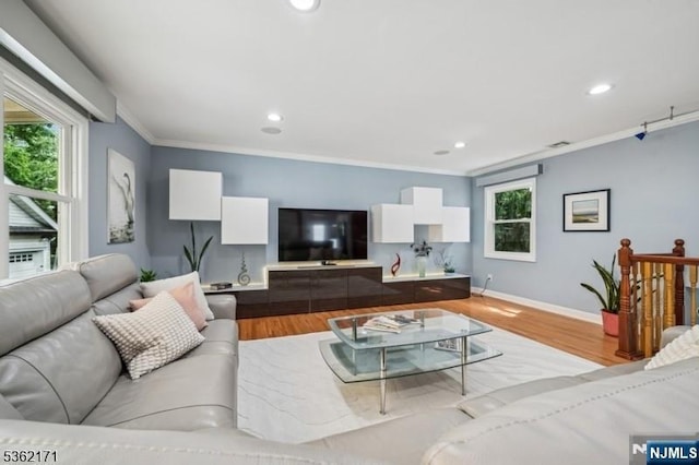 3-11 Lyncrest Ave, Fair Lawn, NJ 07410 - living room featuring plenty of natural light, light wood-style flooring, ornamental molding, recessed lighting, and baseboards