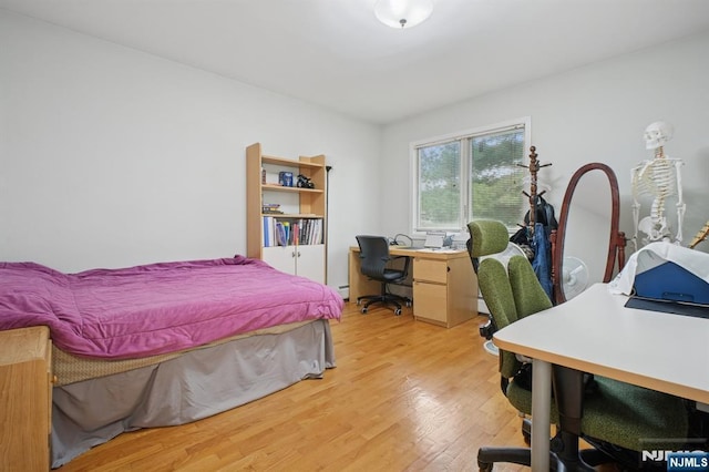 316 Columbia Ave Unit A, Palisades Park, NJ 07650 - bedroom featuring light wood finished floors and an office area