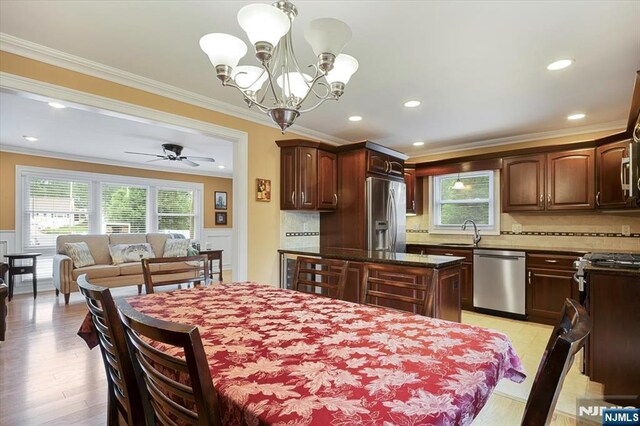 5 Edgewood Ct, Ringwood, NJ 07456 - dining room featuring crown molding, a chandelier, recessed lighting, ceiling fan, and light wood finished floors