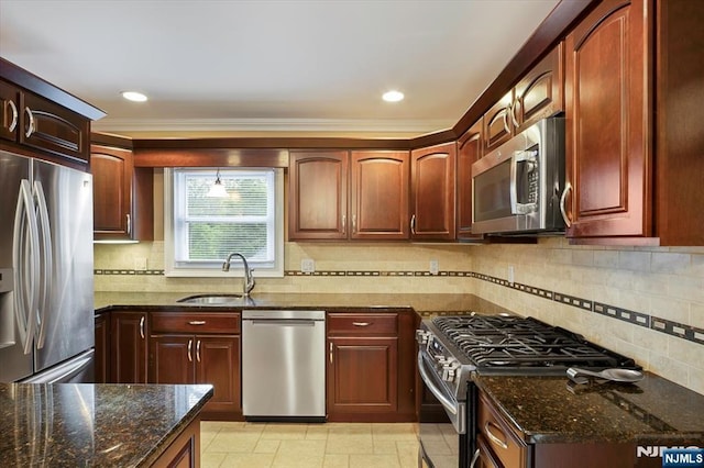 5 Edgewood Ct, Ringwood, NJ 07456 - kitchen with appliances with stainless steel finishes, dark stone countertops, ornamental molding, backsplash, and recessed lighting