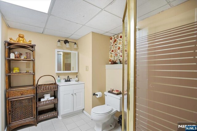 5 Edgewood Ct, Ringwood, NJ 07456 - full bath with a drop ceiling, tile patterned flooring, vanity, and curtained shower
