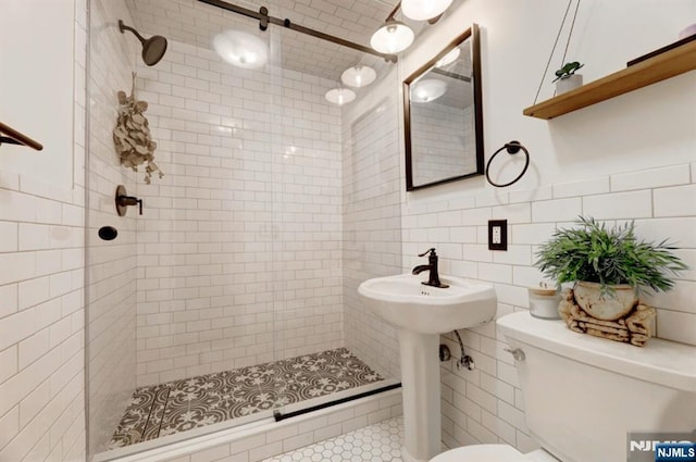 14 Swan Ct, East Rutherford, NJ 07073 - bathroom with a shower stall and tile walls