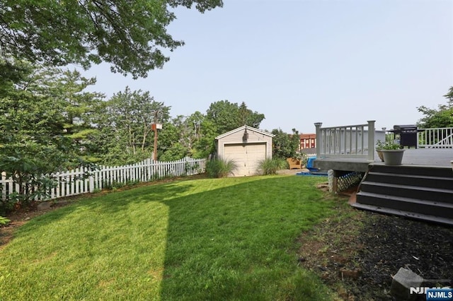 14 Swan Ct, East Rutherford, NJ 07073 - view of yard with an outdoor structure, a deck, and a detached garage