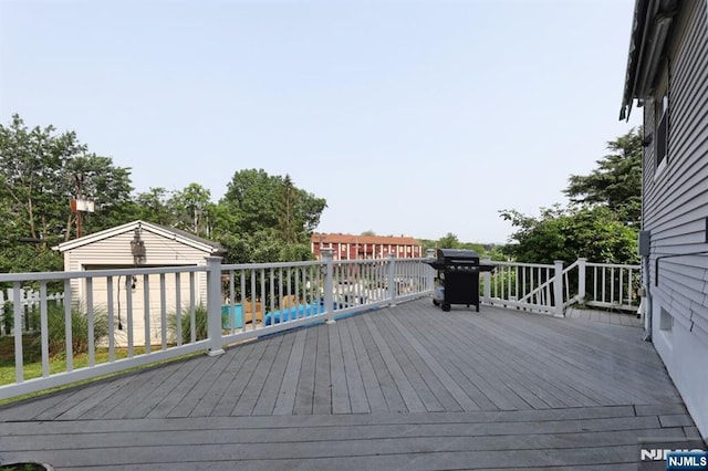 14 Swan Ct, East Rutherford, NJ 07073 - wooden deck with area for grilling