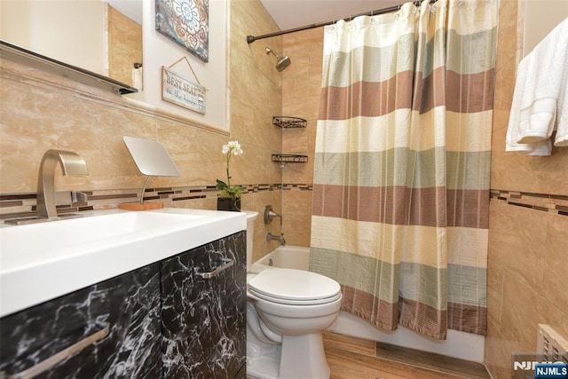 408 Eton Ct, Ridgewood, NJ 07450 - full bathroom with tile walls, shower / tub combo, vanity, wood finished floors, and tasteful backsplash