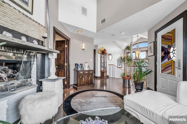 28 Elizabeth Ct, Secaucus, NJ 07094 - living room featuring wood finished floors, a towering ceiling, baseboards, and recessed lighting