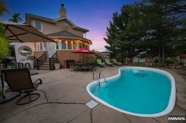 28 Elizabeth Ct, Secaucus, NJ 07094 - view of pool featuring a patio area and outdoor dining area