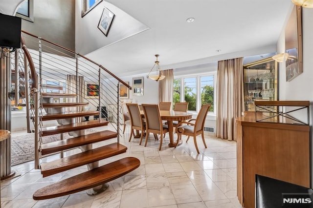 28 Elizabeth Ct, Secaucus, NJ 07094 - dining area with stairs, recessed lighting, and light marble finish floors