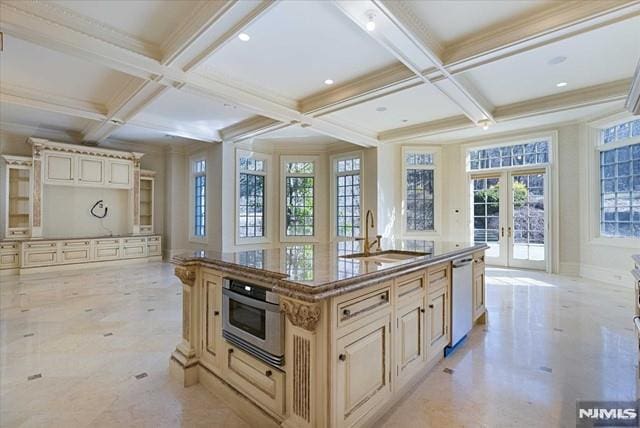 11 Margo Way, Alpine, NJ 07620 - kitchen with french doors, dishwashing machine, coffered ceiling, cream cabinetry, and oven