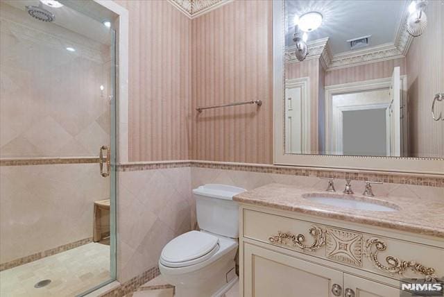 11 Margo Way, Alpine, NJ 07620 - full bathroom with vanity, a shower stall, tile walls, and crown molding