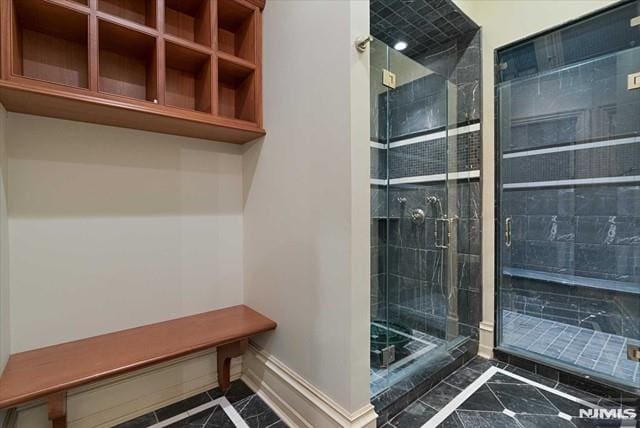 11 Margo Way, Alpine, NJ 07620 - full bathroom featuring inlaid floor details and a stall shower